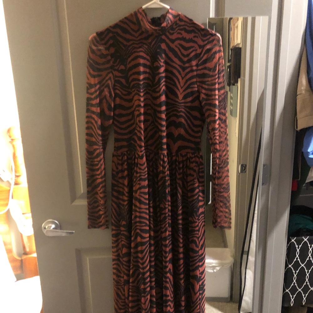 Long Tiger patter dress. A silk feeling material. Never worn.